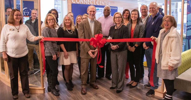 honor credit union celebrated the ribbon cutting and grand opening of the downtown Kalamazoo Connect Center on Friday, November 8, 2019; photo of Honor team members and board members with community leaders in the connect center