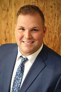 portrait photo of Josh Manwarren
