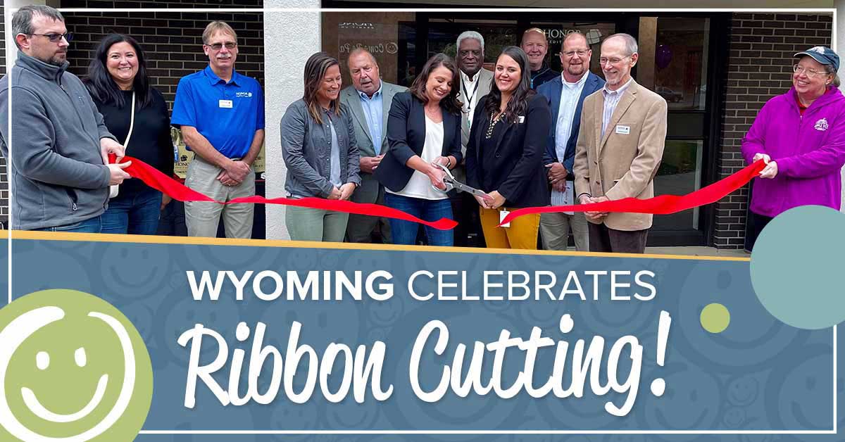 honor team members and wyoming city officials celebrate the ribbon cutting at honor credit union's wyoming member center