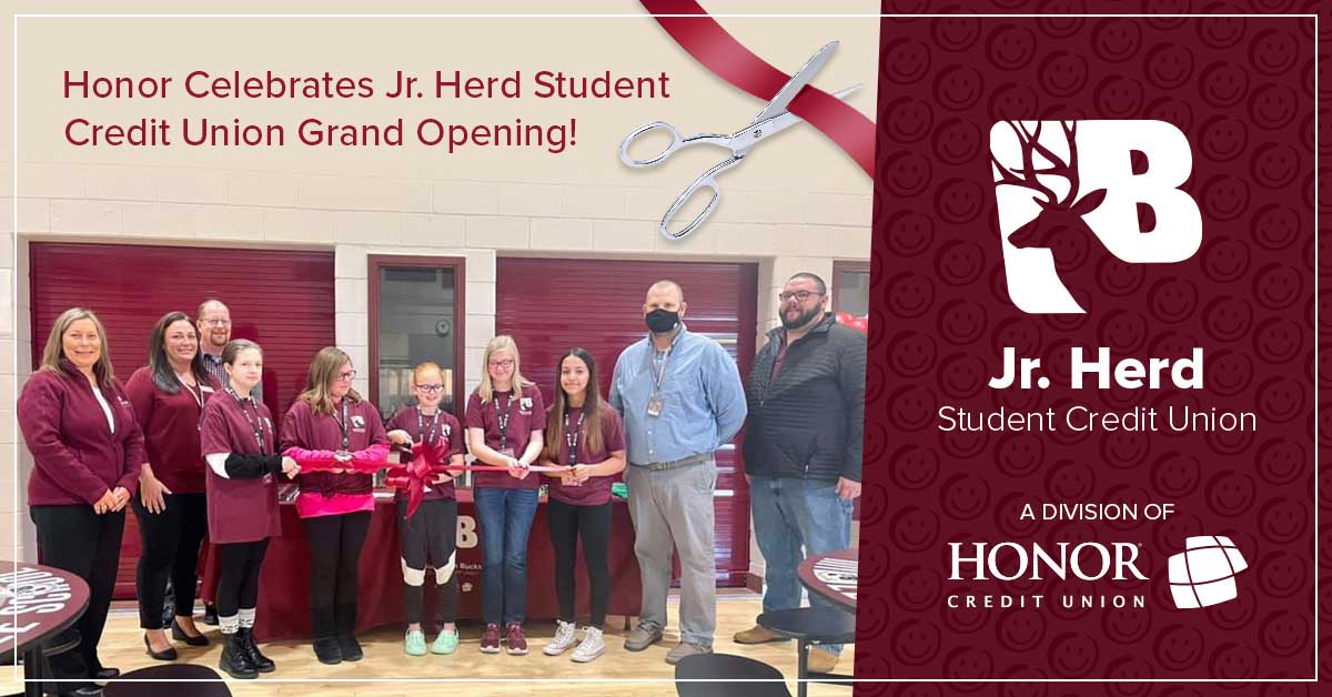 buchanan junior herd student credit union workers posing for a photo with school officials and honor credit union team members at the grand opening celebration on november 3, 2021